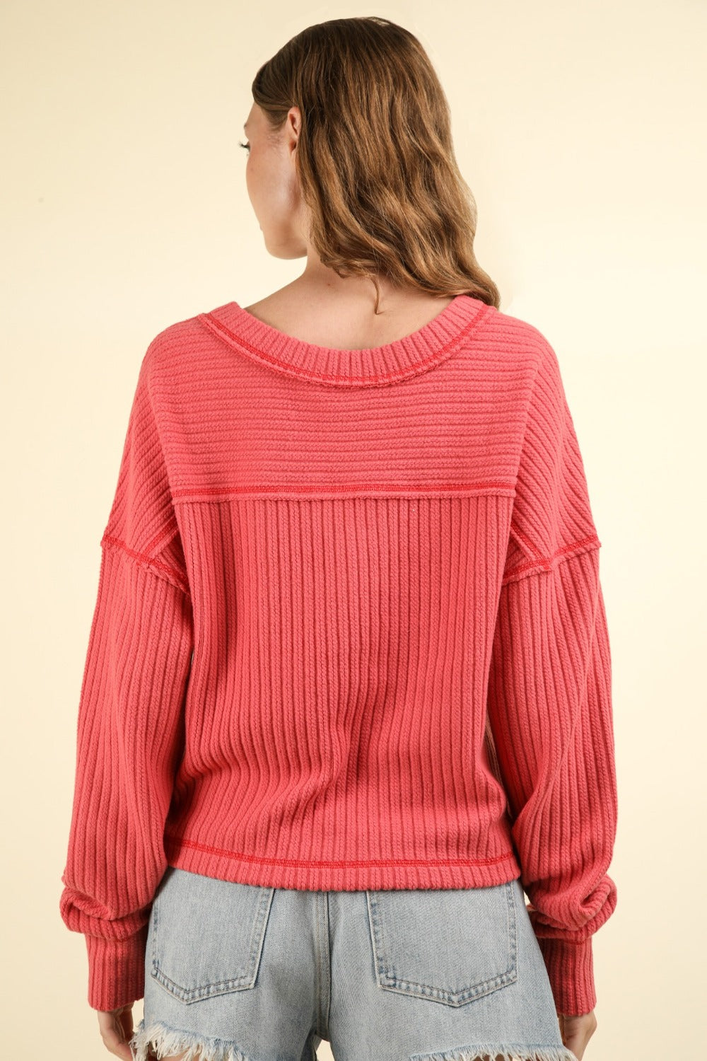 Blanca® | Ribbed knit top with exposed seam and V-neck