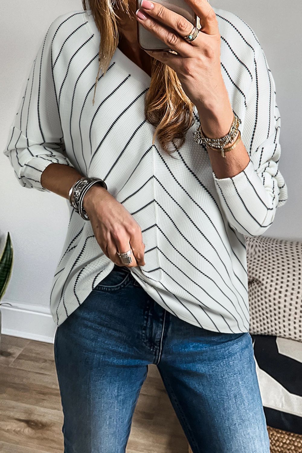 Daniela® | Striped long-sleeved blouse with a V-neck