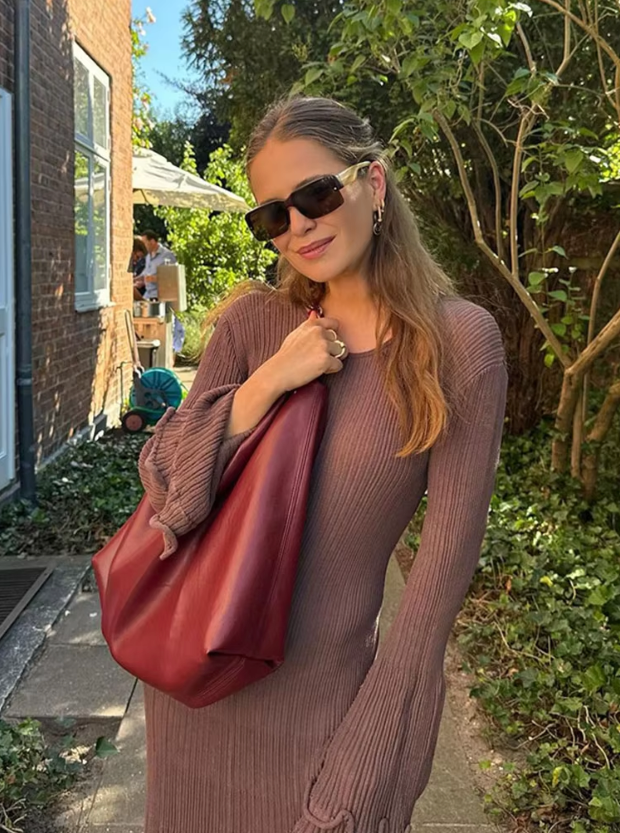 Alma® | Long knitted dress with ruffle hem