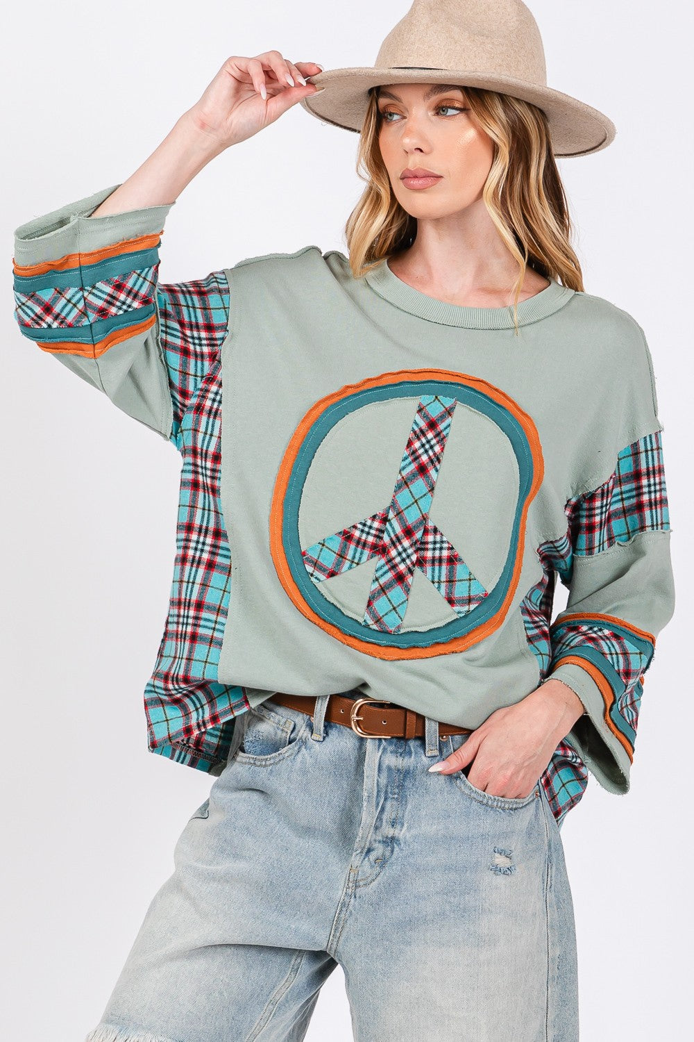 Ariana® | SAGE + FIG top with peace appliqué patch and contrast check
