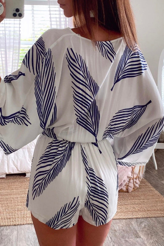 Amanda® | White romper with plant print