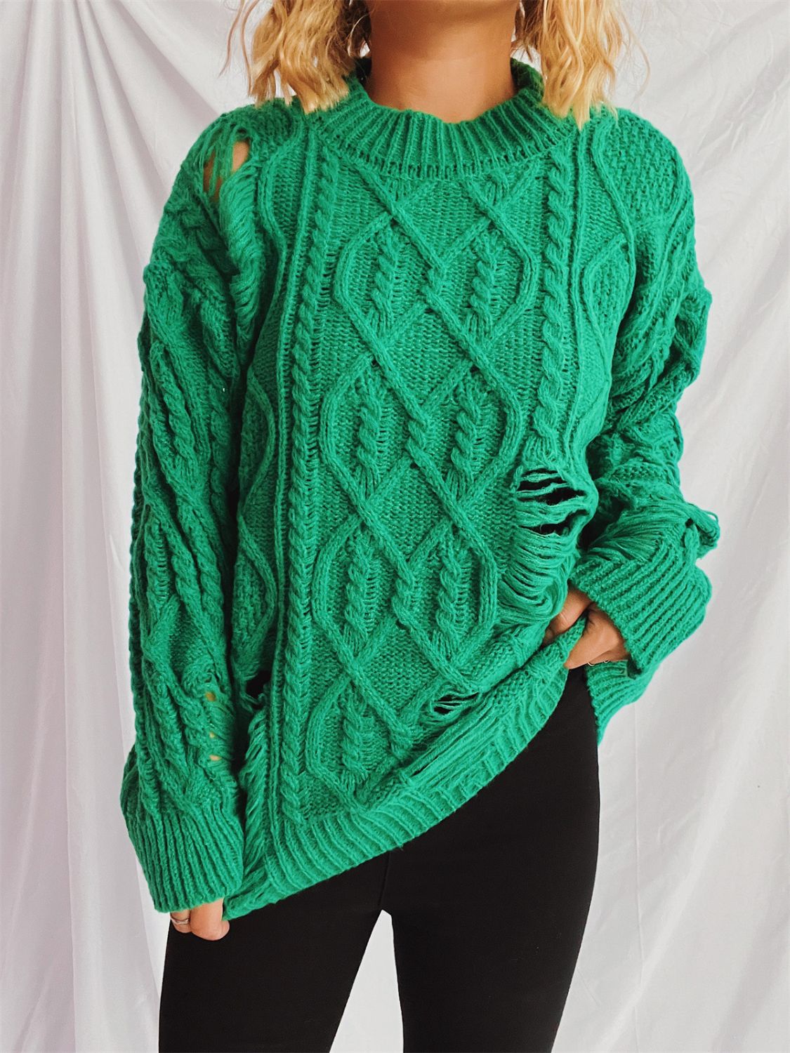 Clara® | Long-sleeved, crew-neck, distressed cable-knit sweater