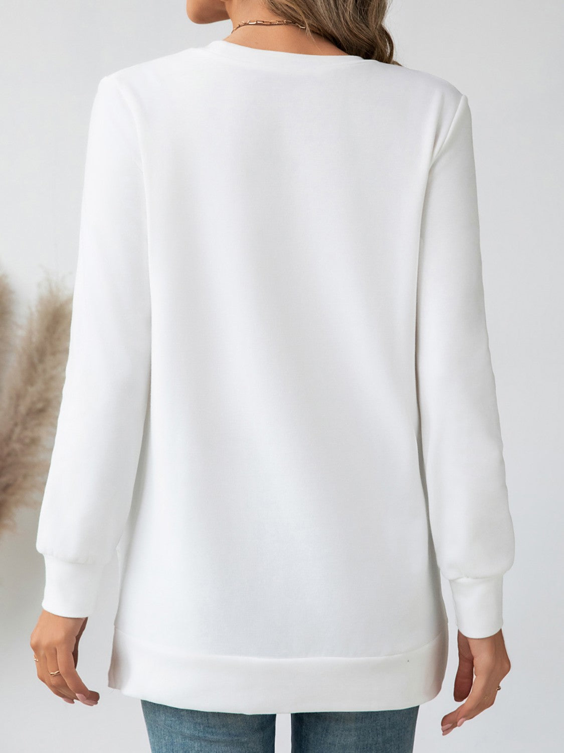 Andrea® | Long-sleeved blouse with a side slit and a round neckline