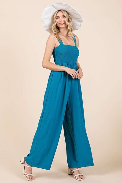 Alina® | Smocked jumpsuit with wide straps and wide legs