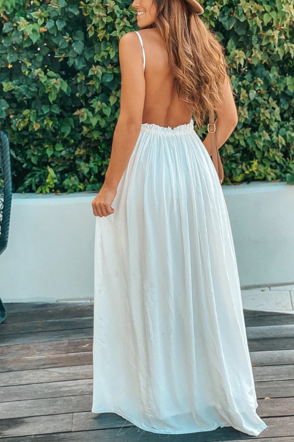 Amparo® | Off-White maxi dress with an open back and frayed hem
