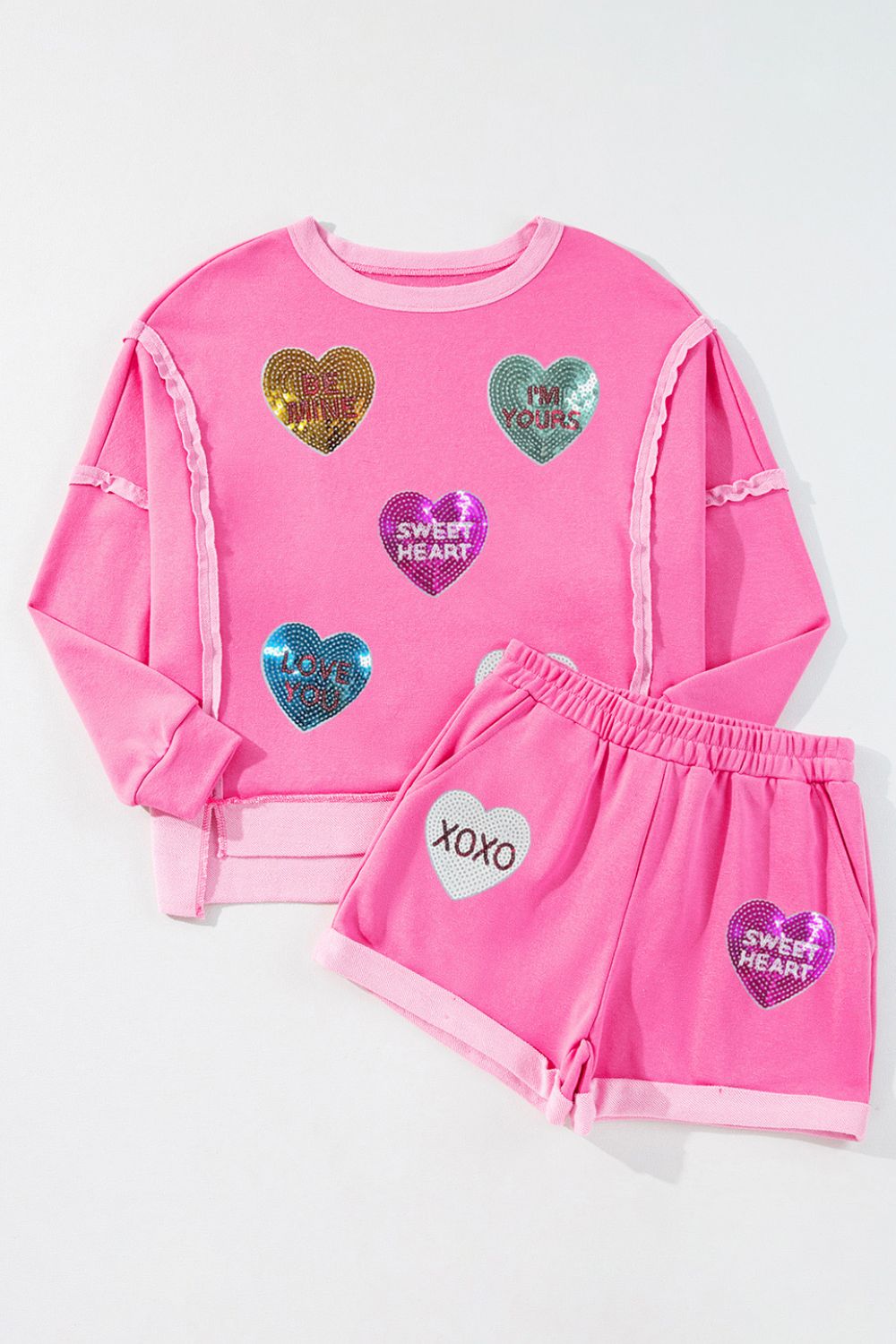 Amara® | Set of top and shorts with sequin heart and crew neck