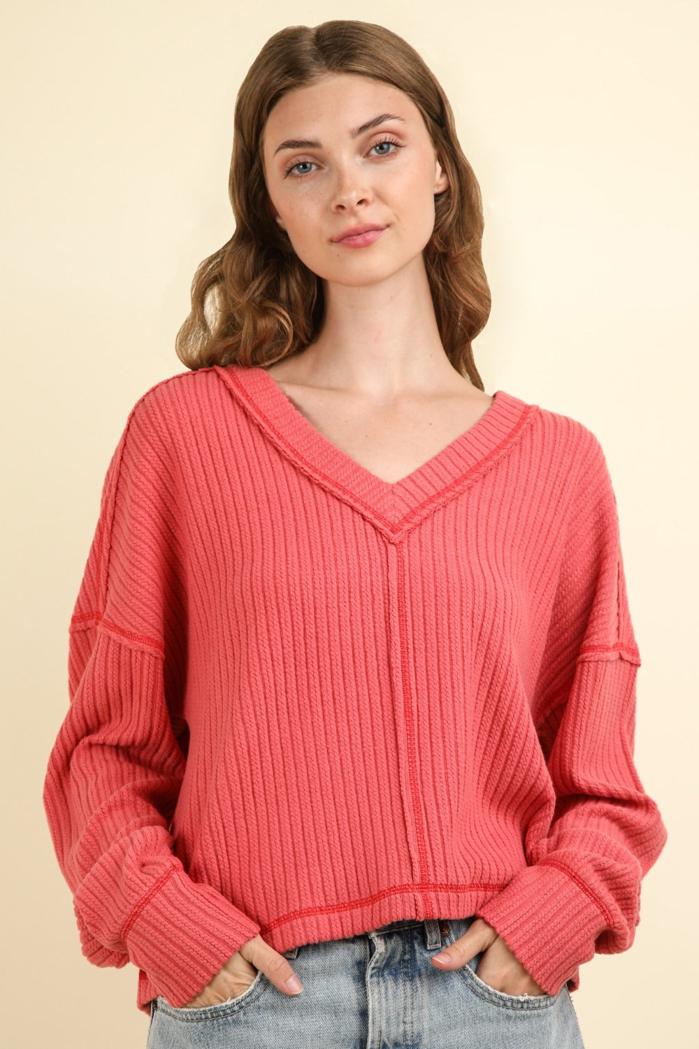 Blanca® | Ribbed knit top with exposed seam and V-neck