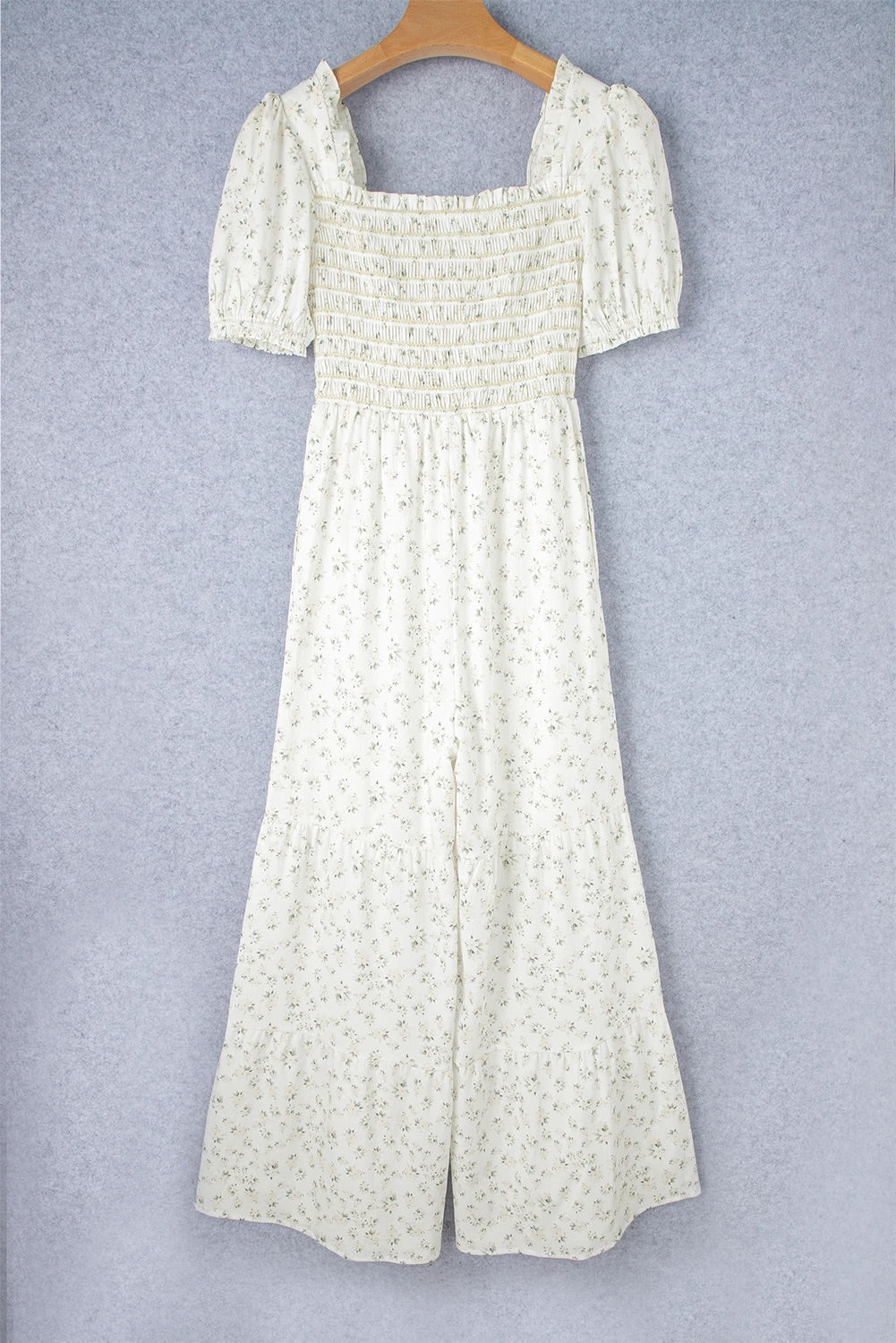 Allison® | White smocked floral jumpsuit with puff sleeves and high waist