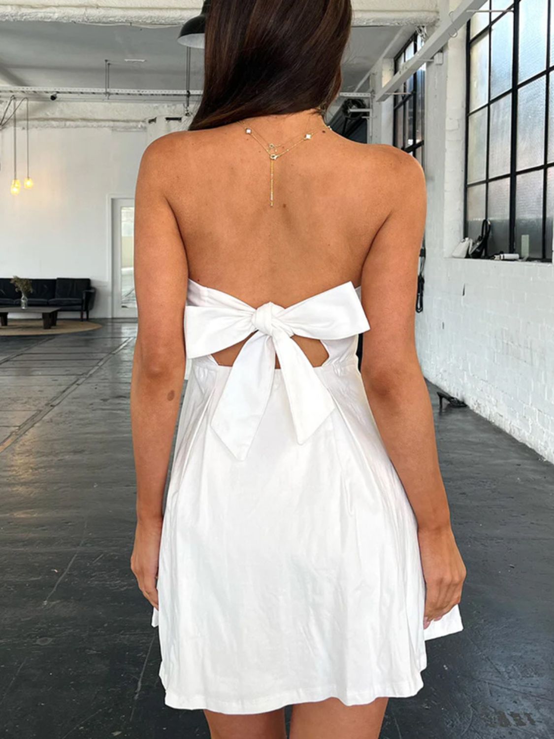 Antonia® | Tube mini dress with a bow at the back