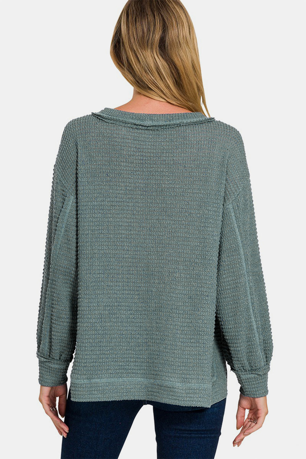 Daria® | Long sleeve top with exposed seam and side slit