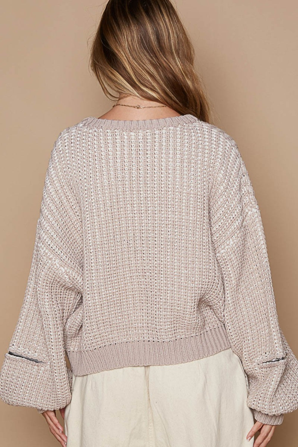 Camila® | Round neck sweater with heart patch and zip and pointed sleeves