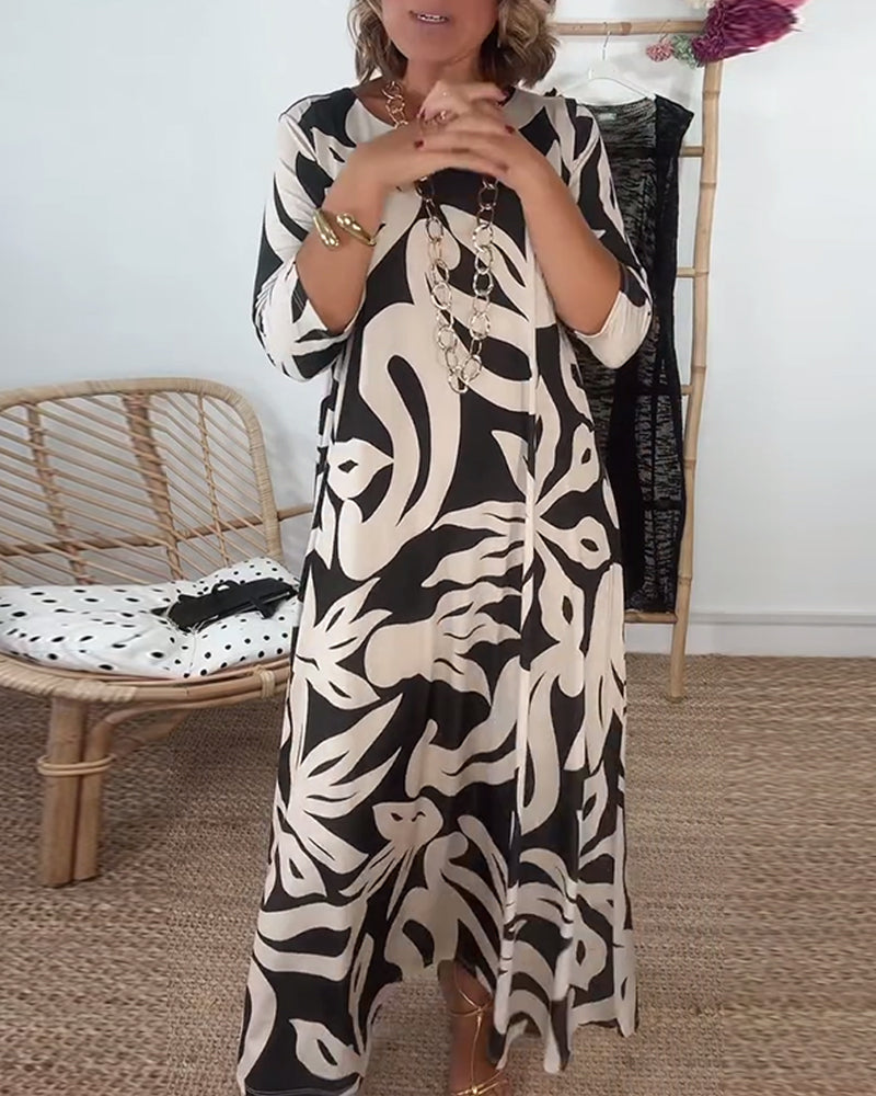 Carina® | Long-sleeved dress with a crew neck and a print