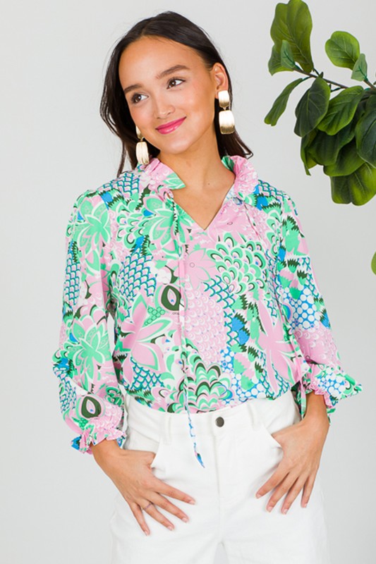 Clementine® | Green, loosely tied blouse with a floral pattern and a V-neck
