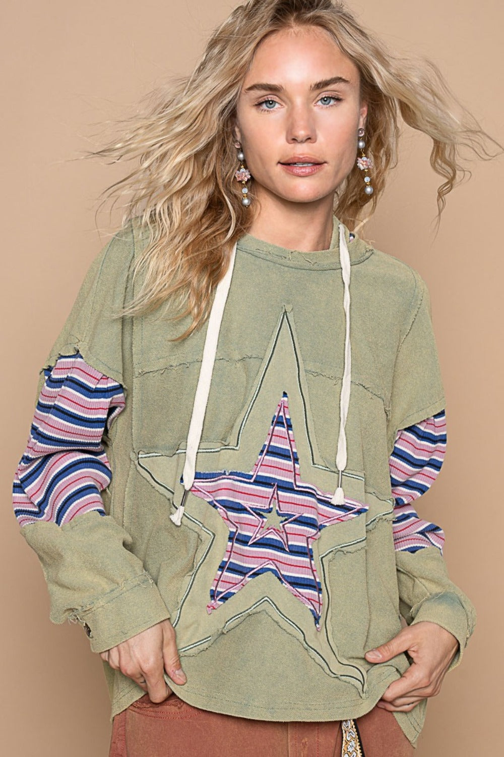 Carla® | French terry hoodie with star patchwork and raw edges