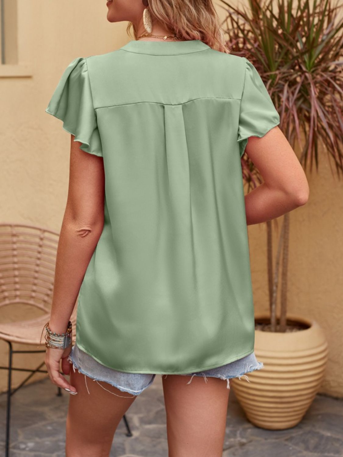 Clara® | Notched short sleeve blouse