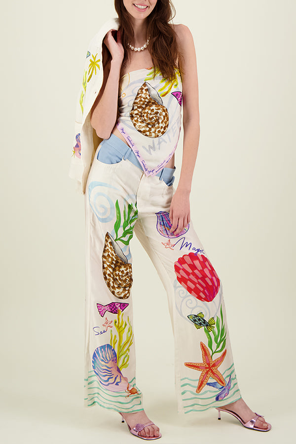 Ana® | Satin pants with a unique print on the back, elastic waist, pockets and wide leg