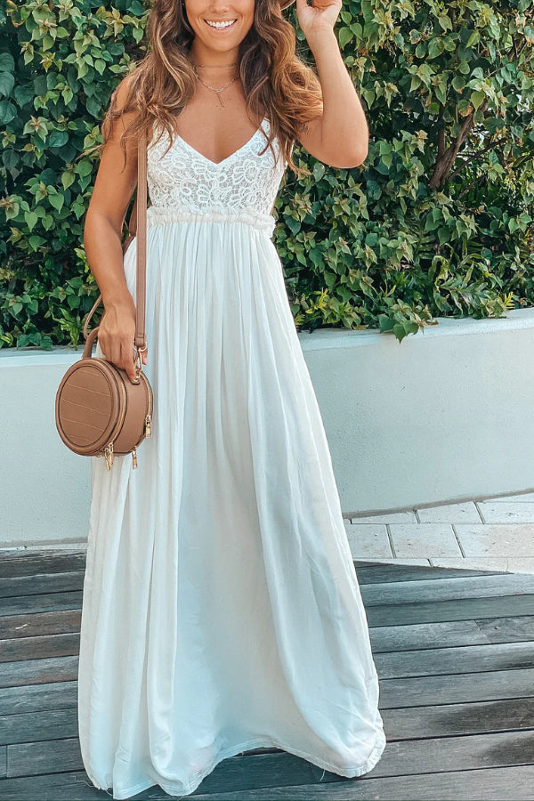 Amparo® | Off-White maxi dress with an open back and frayed hem