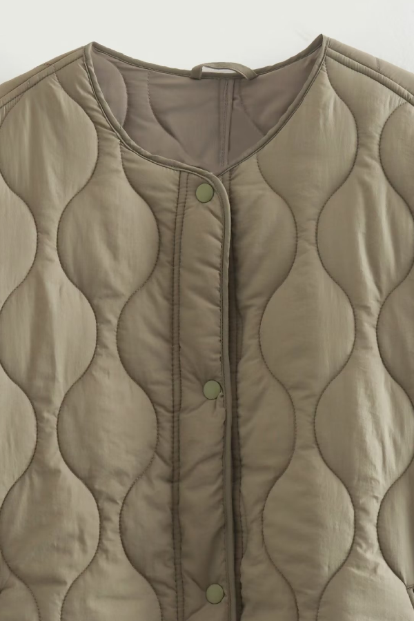 Casandra® | Solid Color Loose Round Neck Quilted Jacket