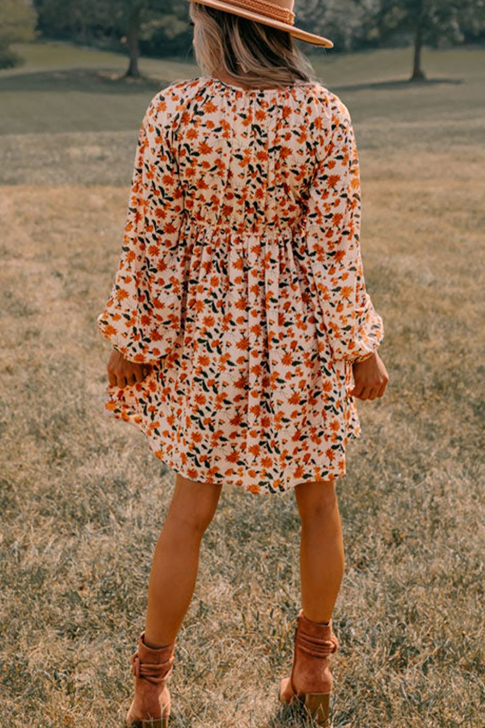 Amparo® | Smocked printed long sleeve dress with V-neck