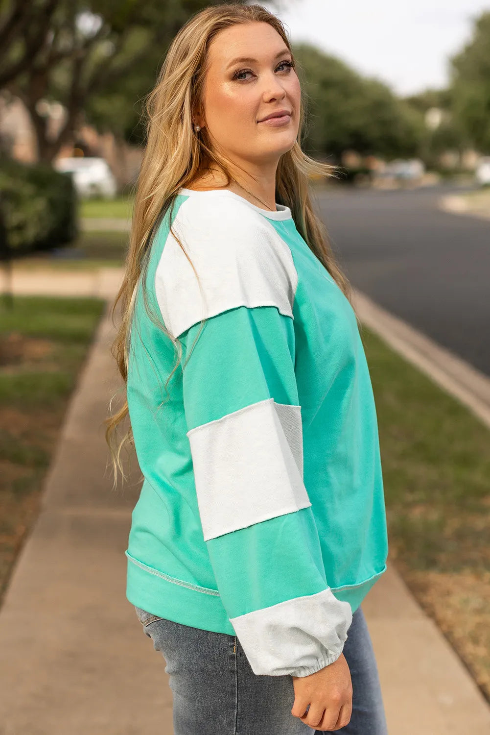 Elena® | Plus size color block long sleeve sweatshirt with exposed seams