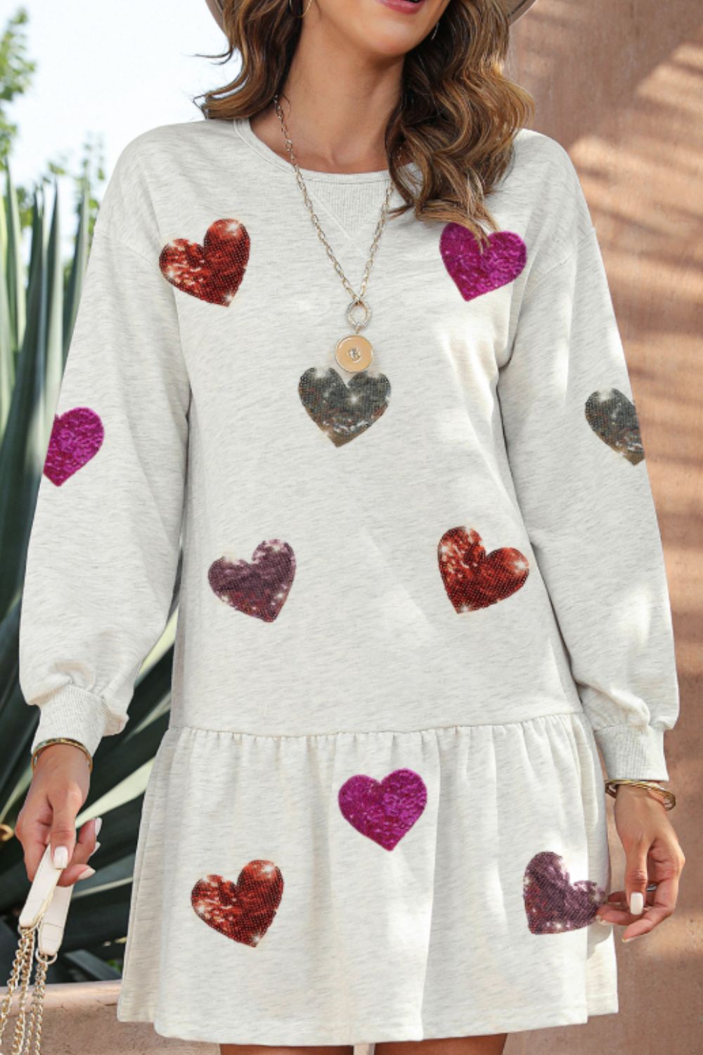 Andrea® | Long sleeve mini dress with sequins and a heart round neckline