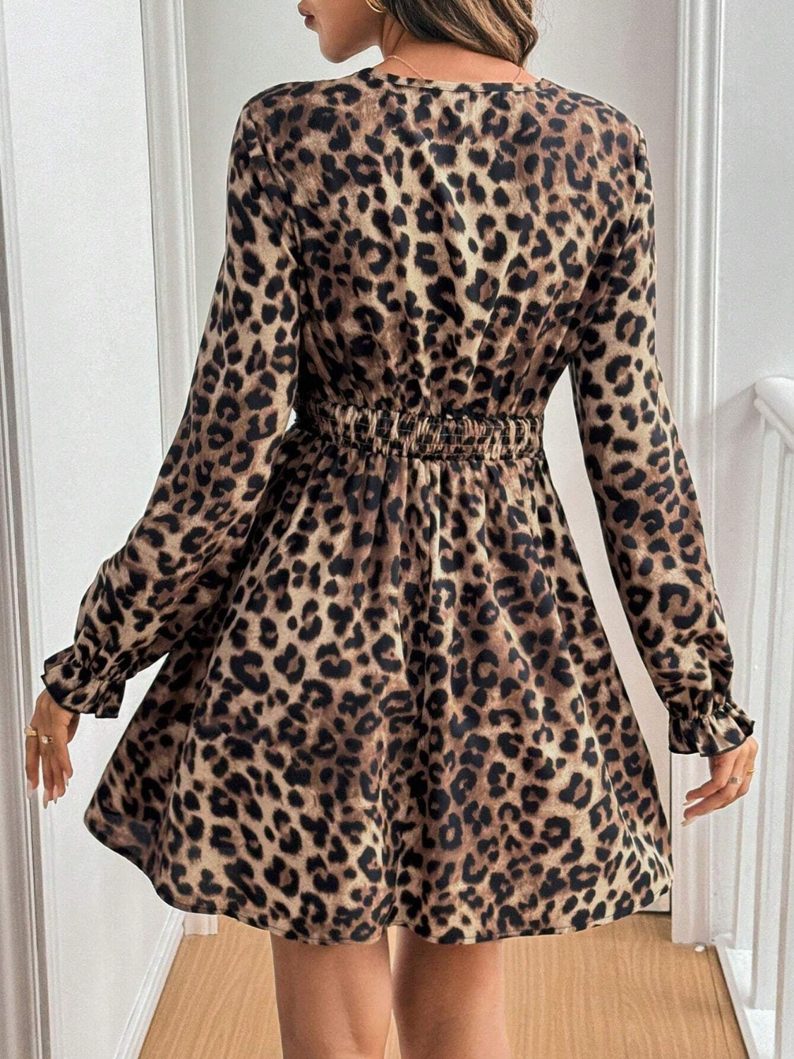 Caridad® | Mini dress with lace detail and leopard flounce sleeves