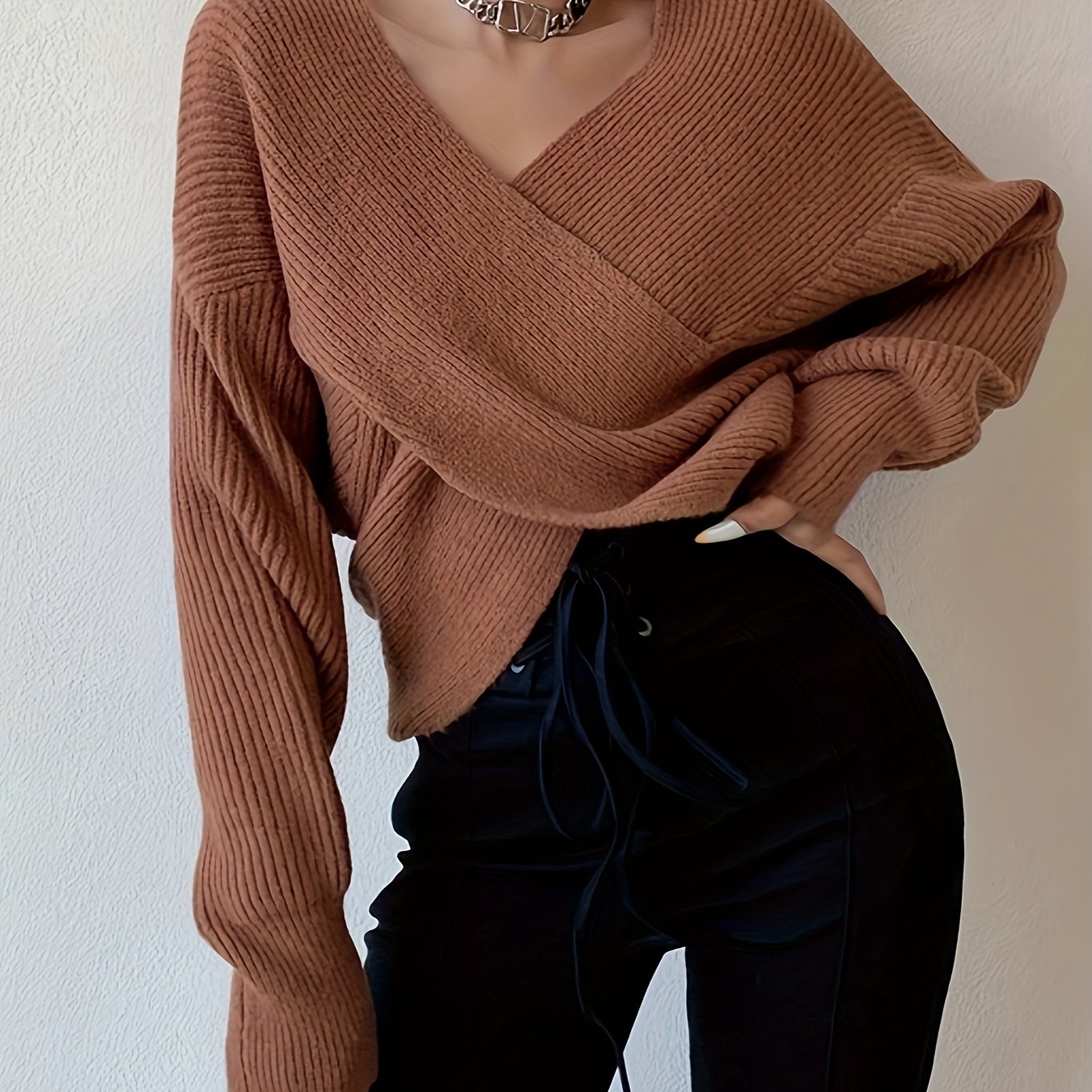 Elda® | Solid knit sweater with a wrap front