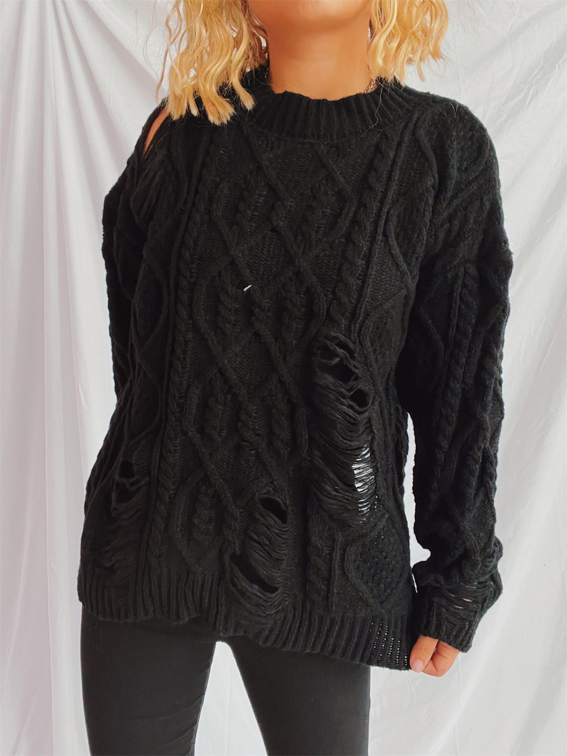 Clara® | Long-sleeved, crew-neck, distressed cable-knit sweater