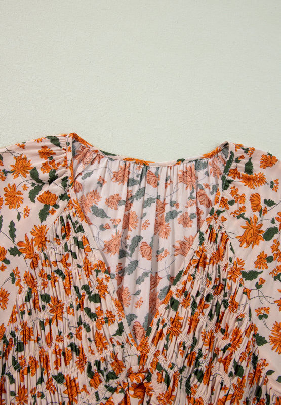Amparo® | Smocked printed long sleeve dress with V-neck