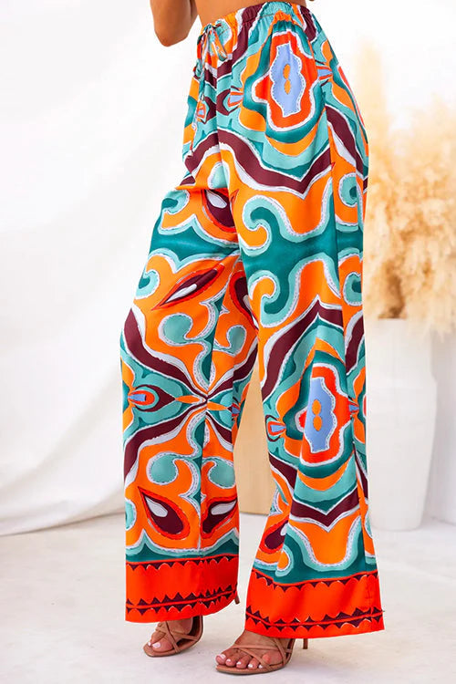 Consuelo® | Satin ethnic abstract print wide leg pants in satin with elastic waistband and pockets