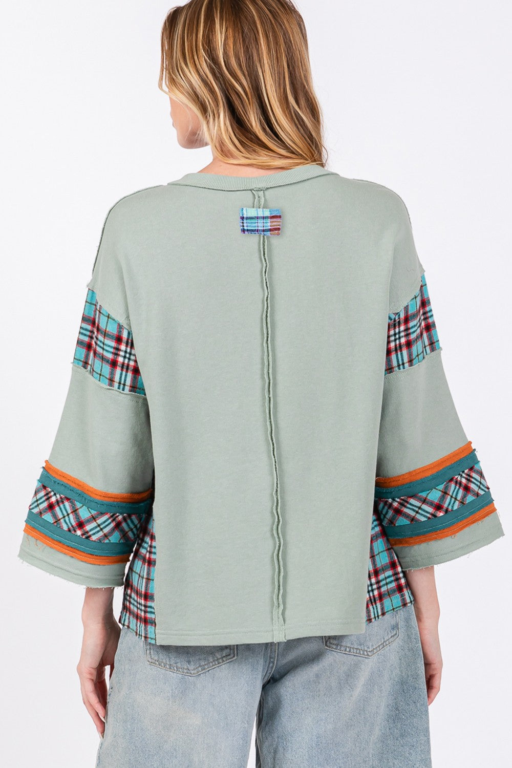 Ariana® | SAGE + FIG top with peace appliqué patch and contrast check