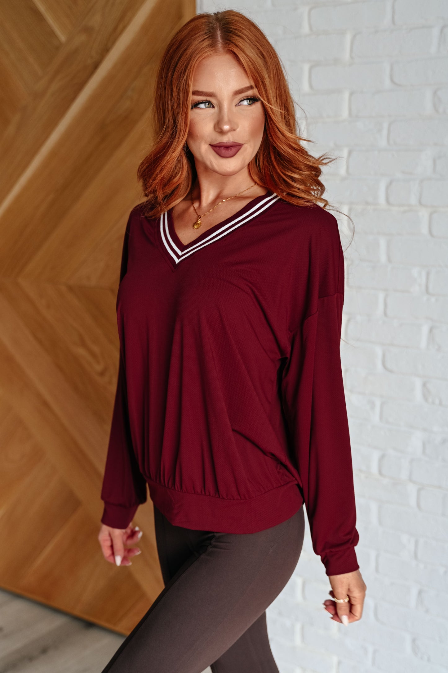 Bruna® | All Out Comfort V-neck sweater in Red Merlot