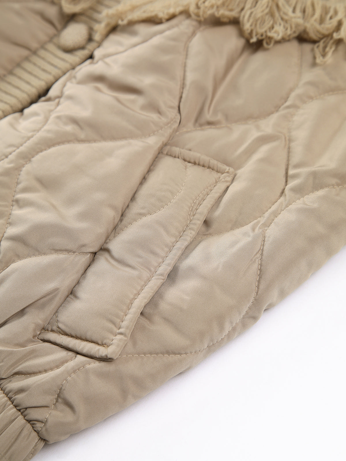 Carolina® | Patchwork quilted jacket with cable knit