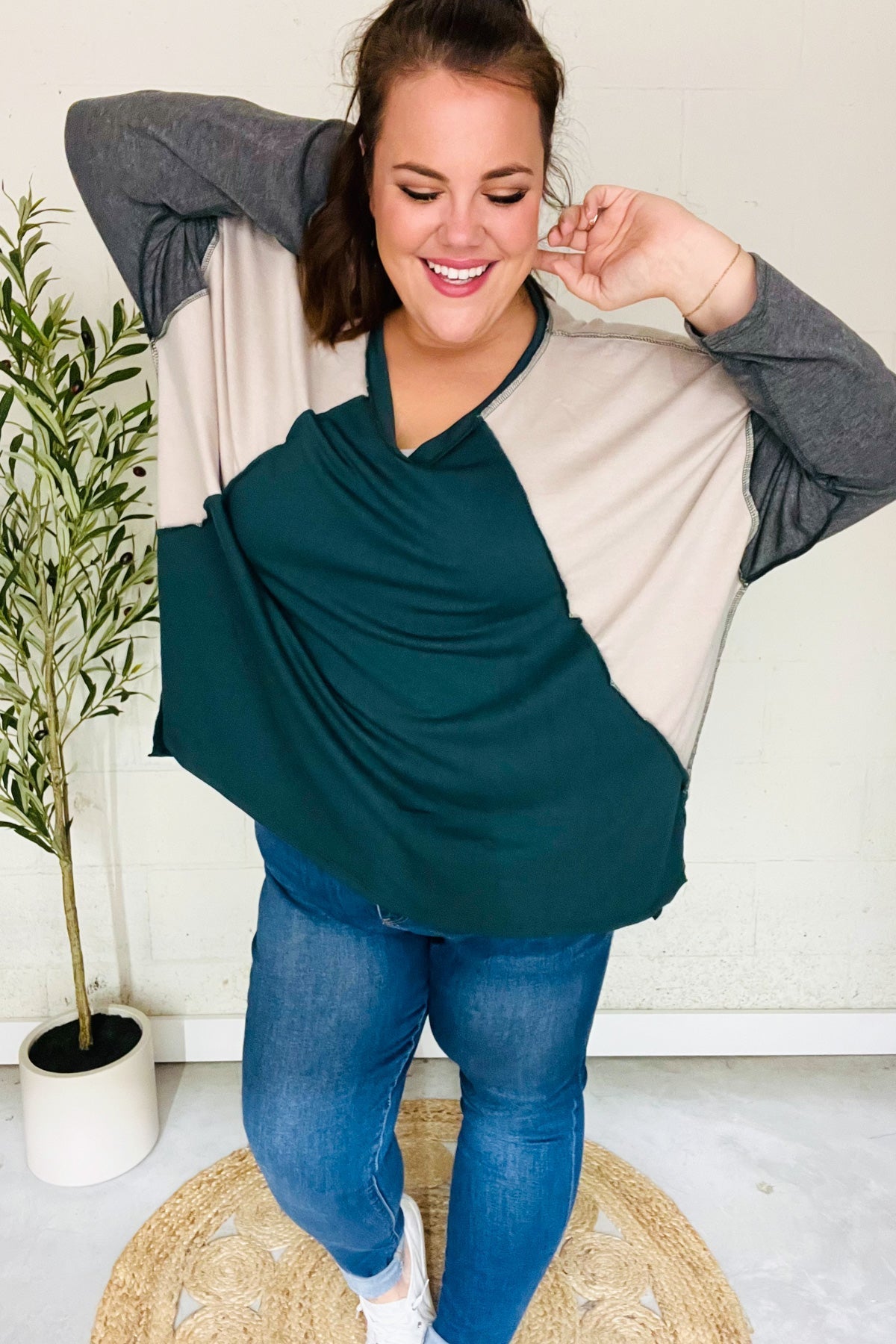 Beate® | Standout hunter green raglan top with color block outseam and V-neckline