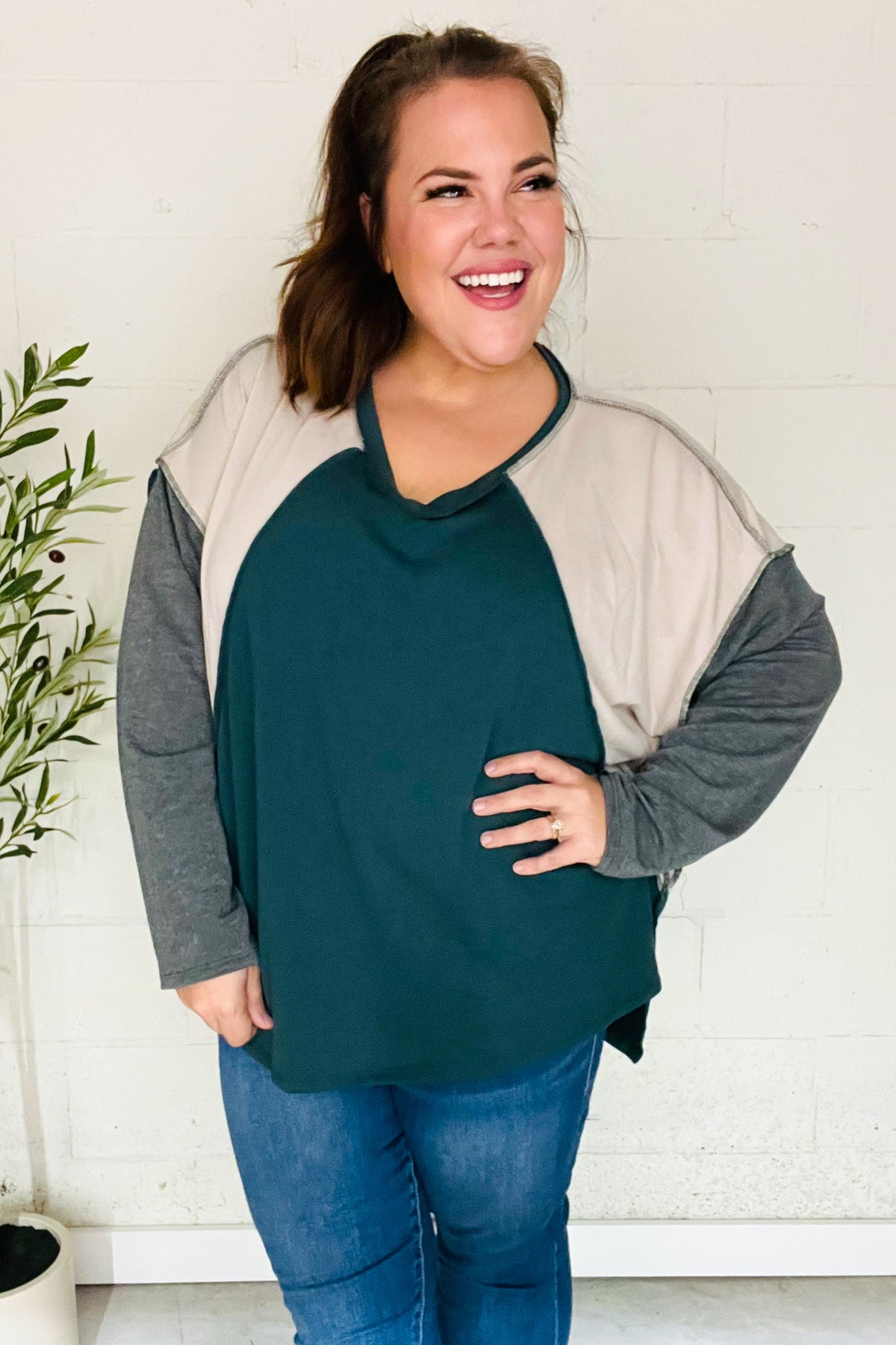 Beate® | Standout hunter green raglan top with color block outseam and V-neckline