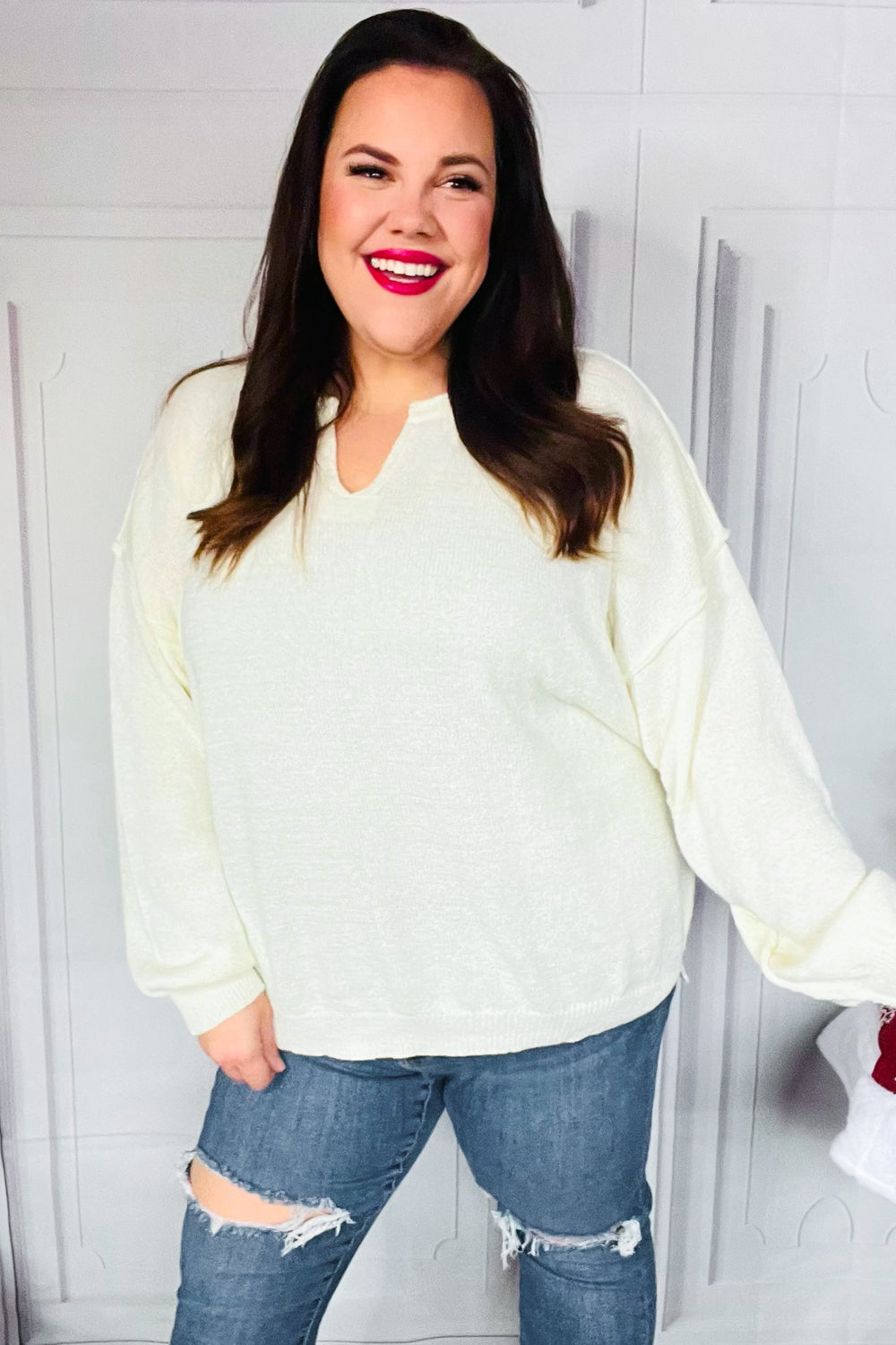 Avis® | Lock Eyes Ivory oversized sweater with notched neckline and patch