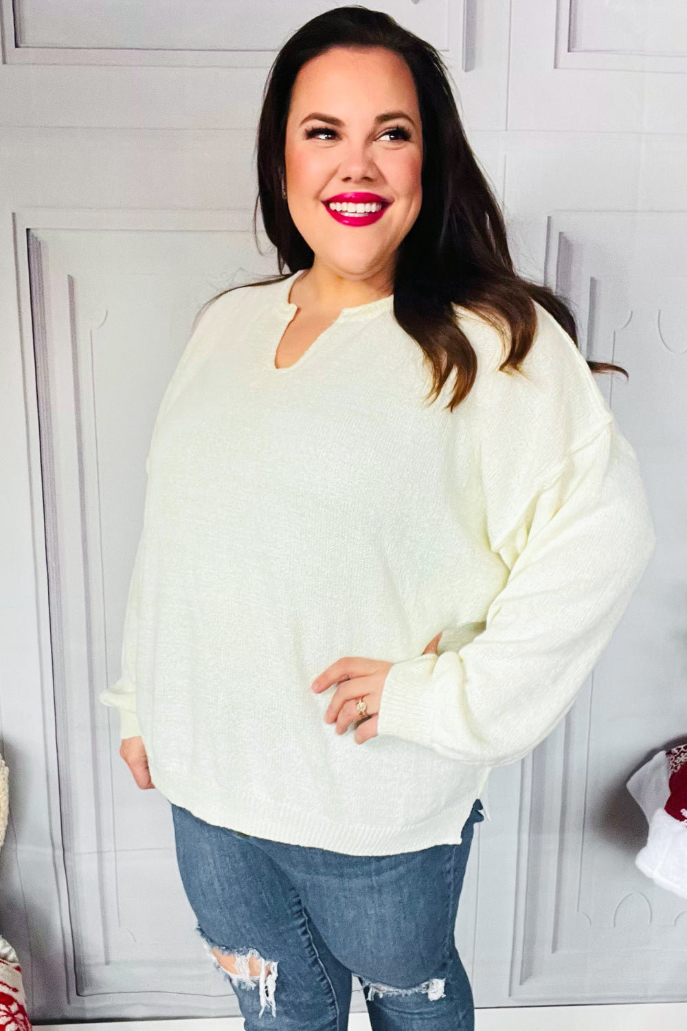 Avis® | Lock Eyes Ivory oversized sweater with notched neckline and patch