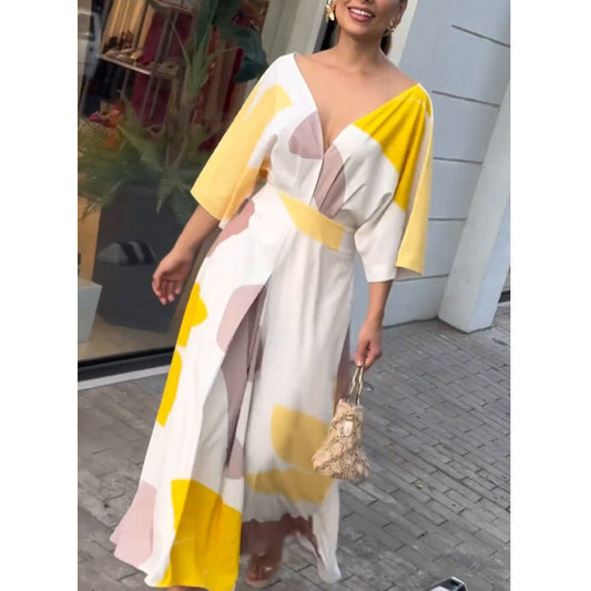 Andrea® | Asymmetrical set with fringes and geometric print