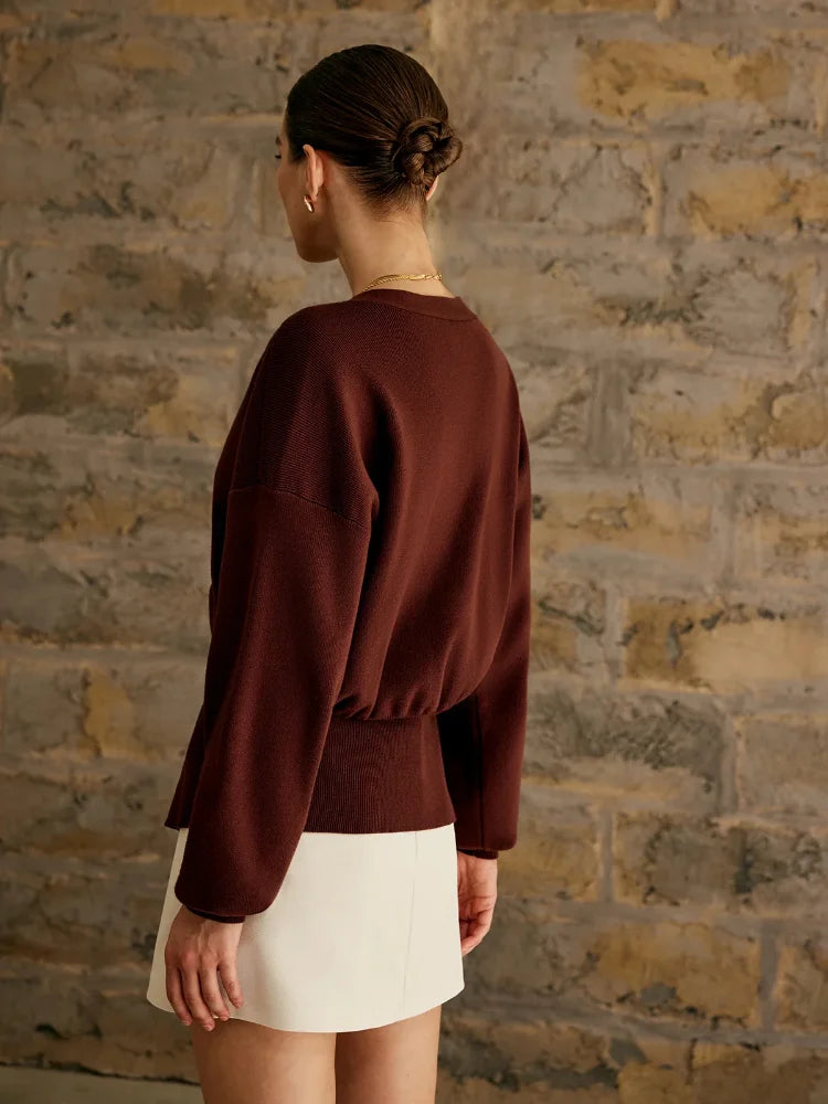 Brigida® | Stylish women's knitted sweater with a button placket in a solid color