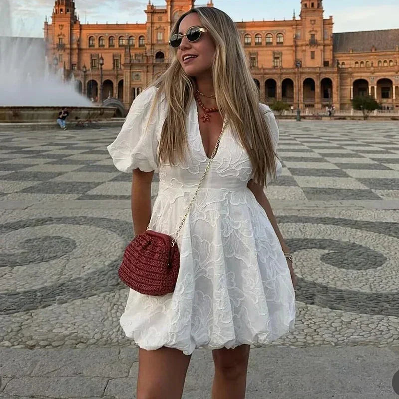 Claudia® | Elegant white mini dress with puff sleeves