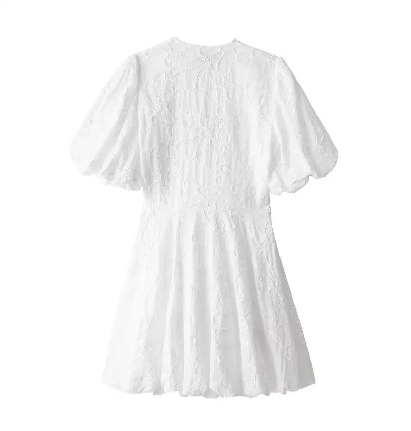 Claudia® | Elegant white mini dress with puff sleeves