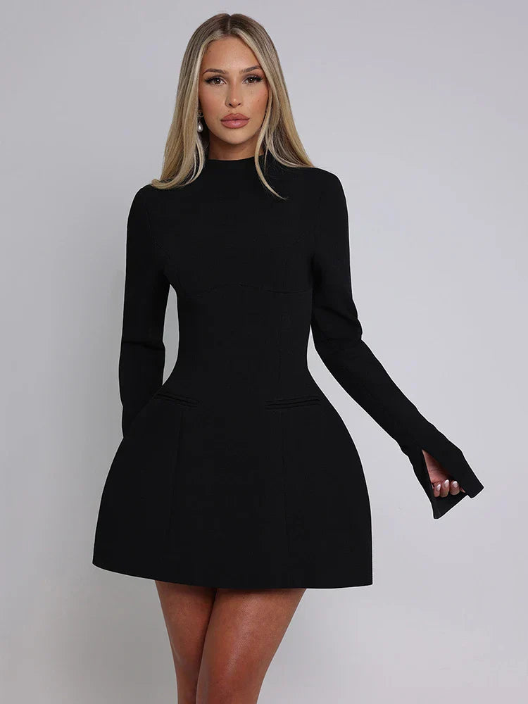 Carmen® | Backless dress with long sleeves and flared cut