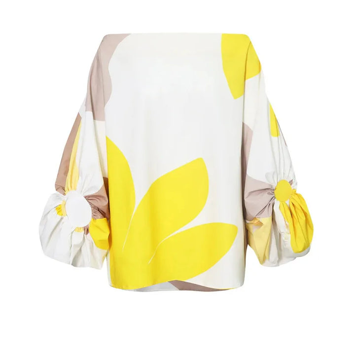 Andrea® | Asymmetrical set with fringes and geometric print