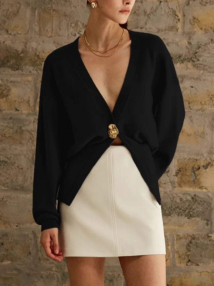 Brigida® | Stylish women's knitted sweater with a button placket in a solid color