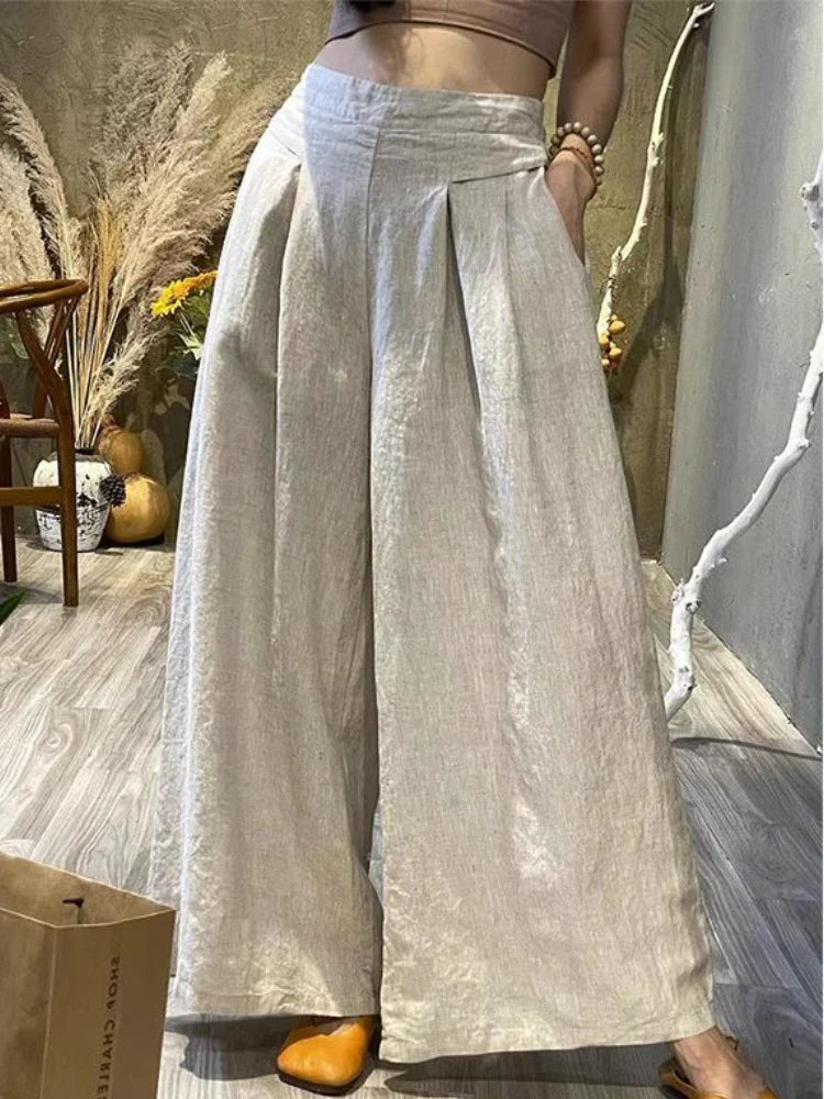 Angela® | Wide pleated trousers