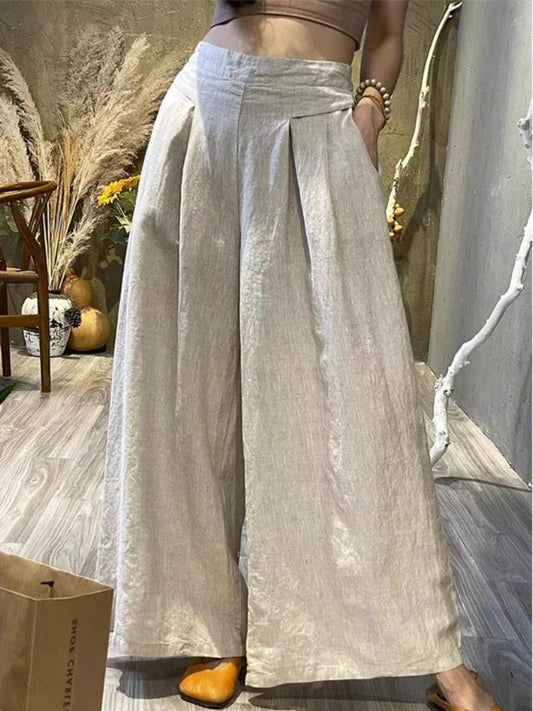 Angela® | Wide pleated trousers
