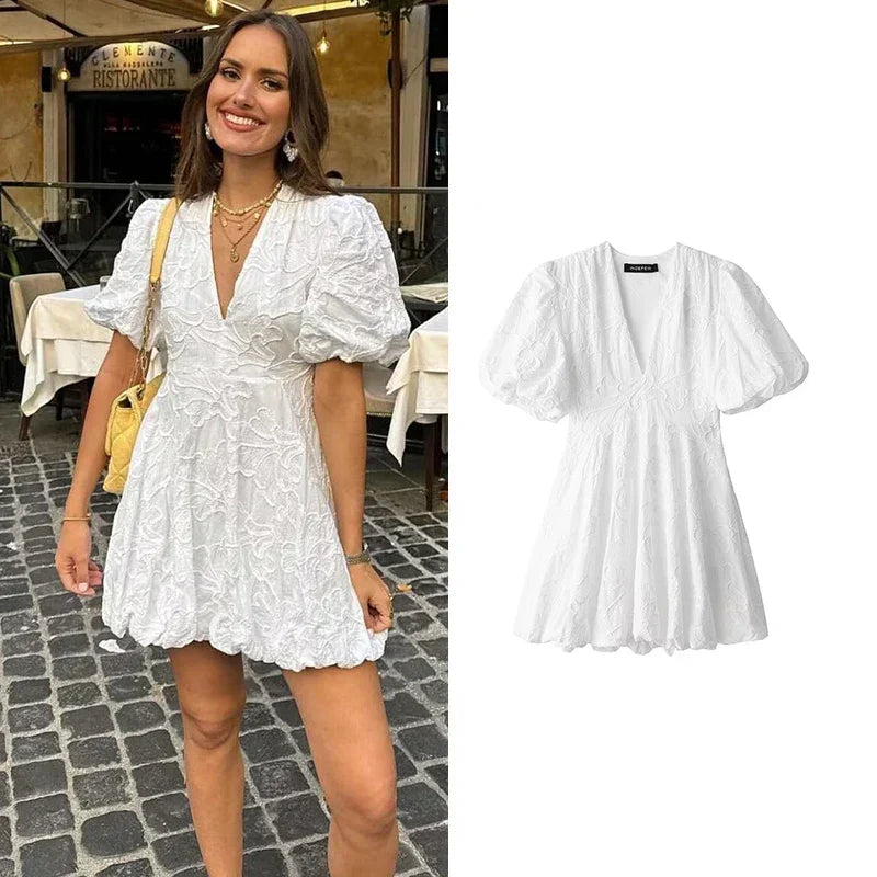 Claudia® | Elegant white mini dress with puff sleeves