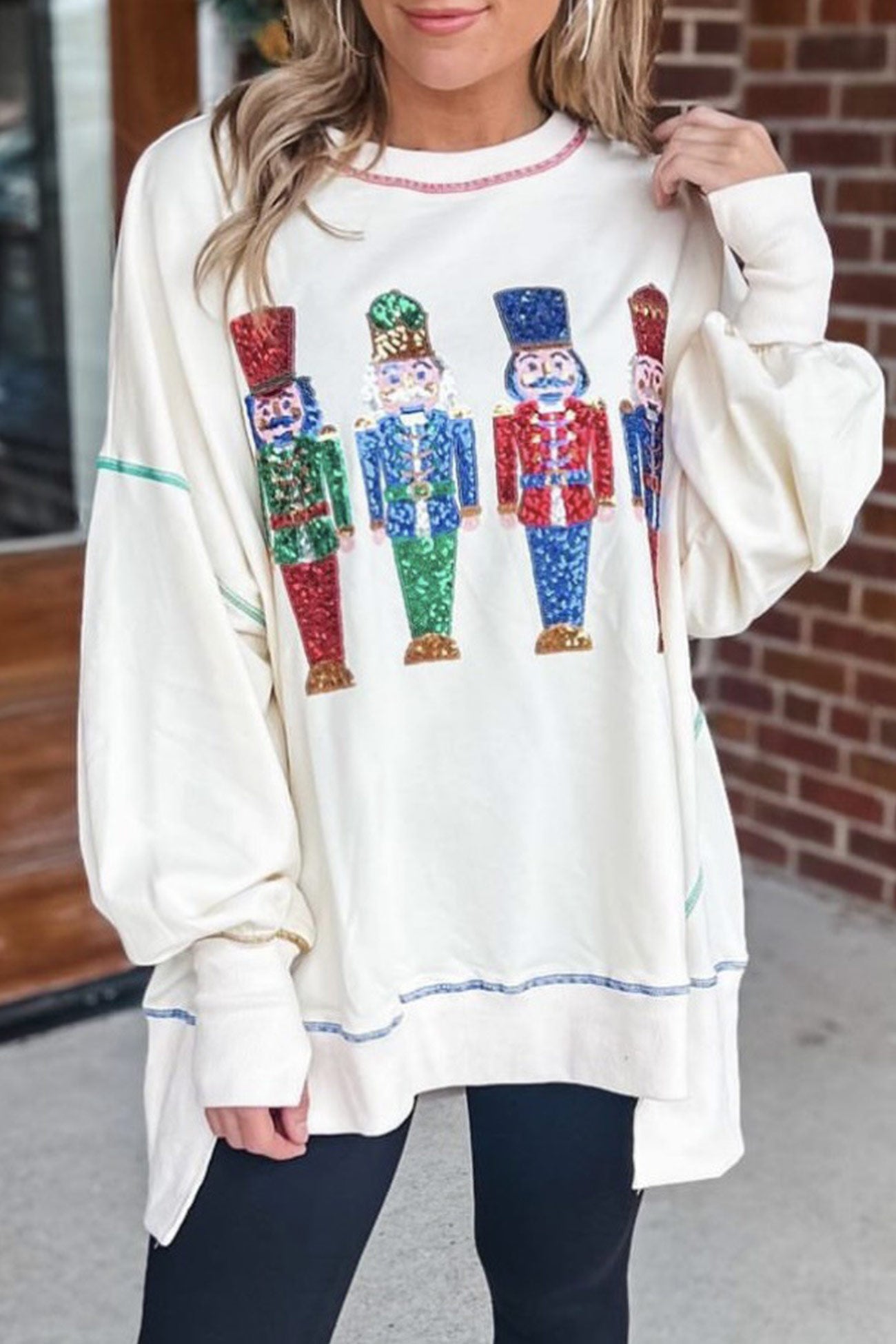 Dominique® | Sequin graphic sweatshirt with slit hem