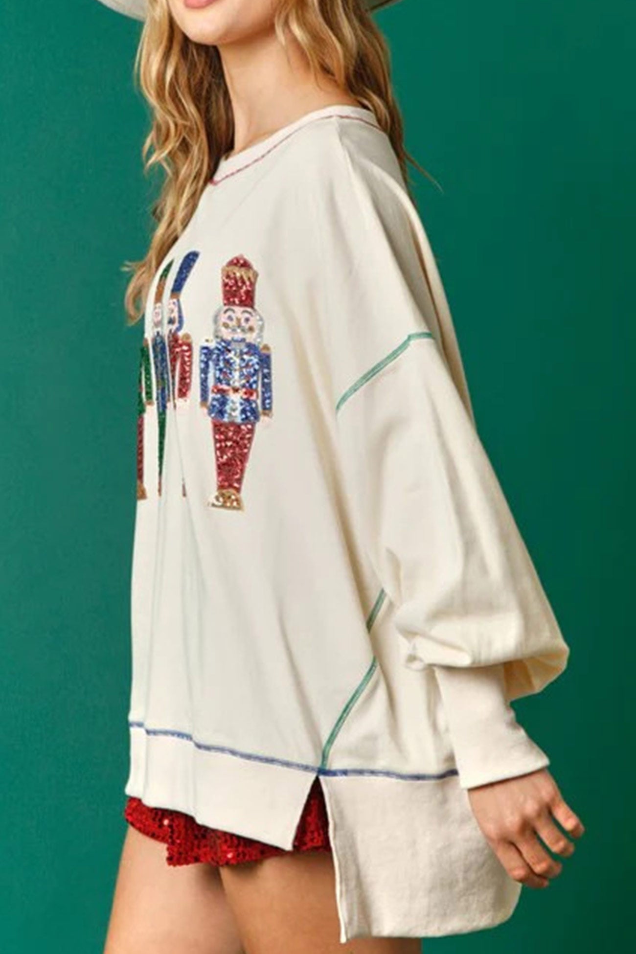 Dominique® | Sequin graphic sweatshirt with slit hem