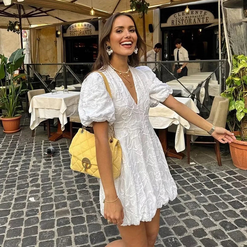 Claudia® | Elegant white mini dress with puff sleeves